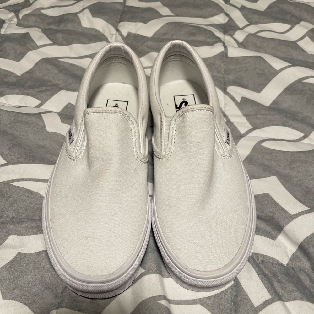 Brand new never worn vans white slip on